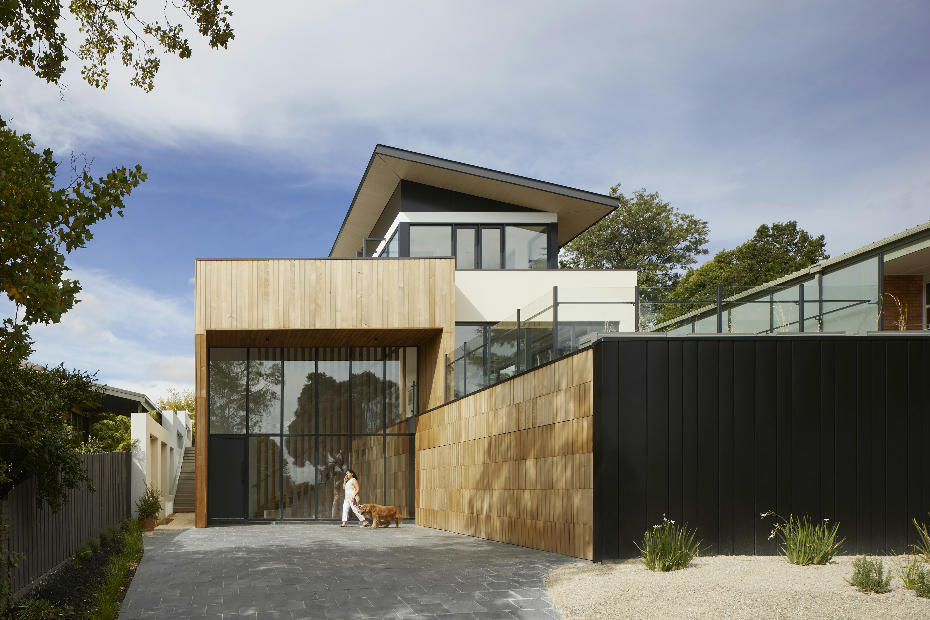 Contemporary house exterior with warm timber cladding